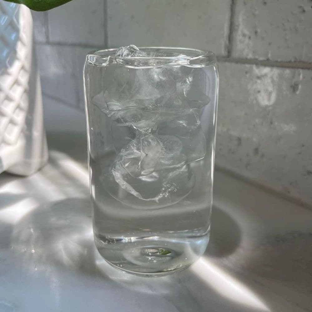 clear glass cup with water